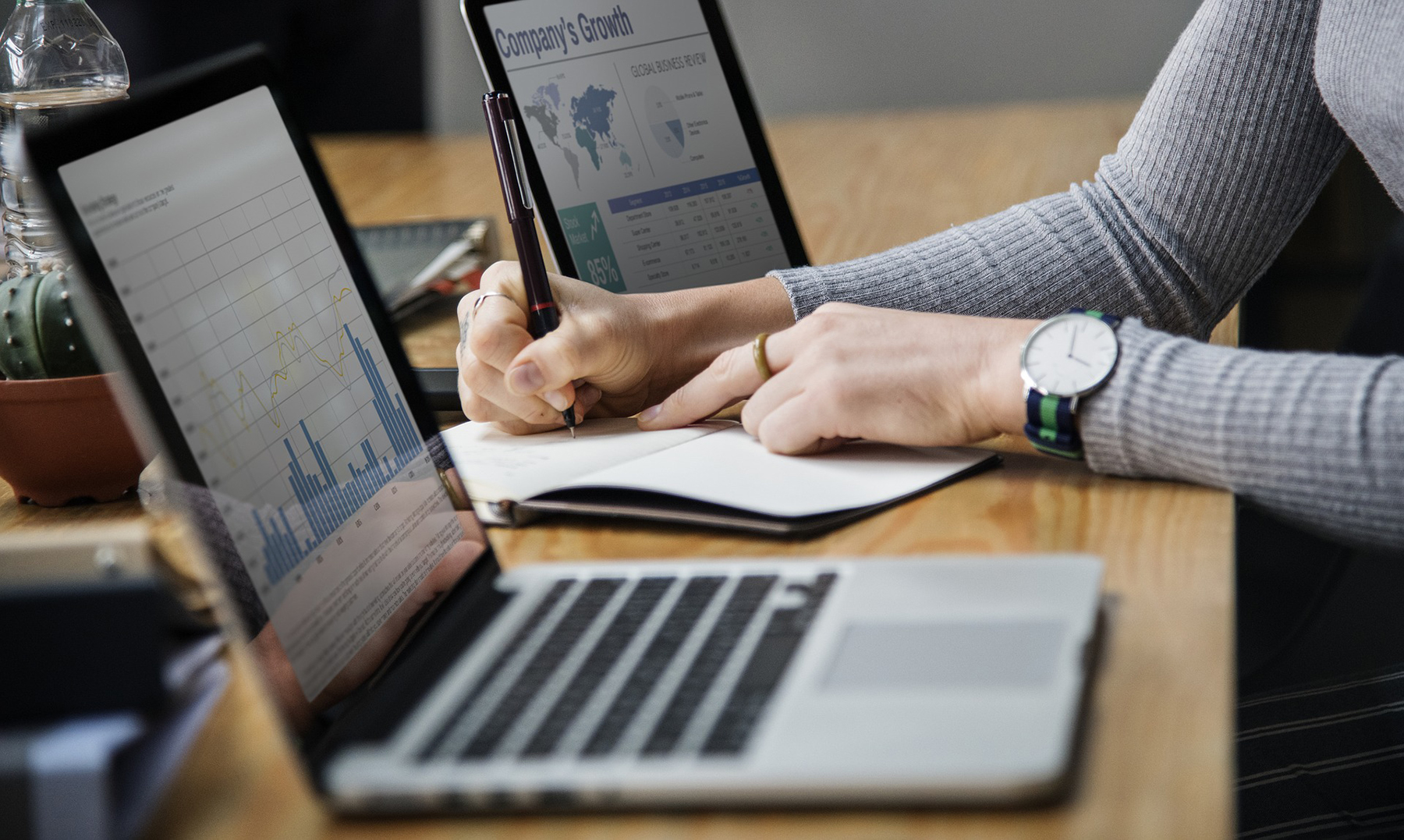 Financial analyst reviewing business charts