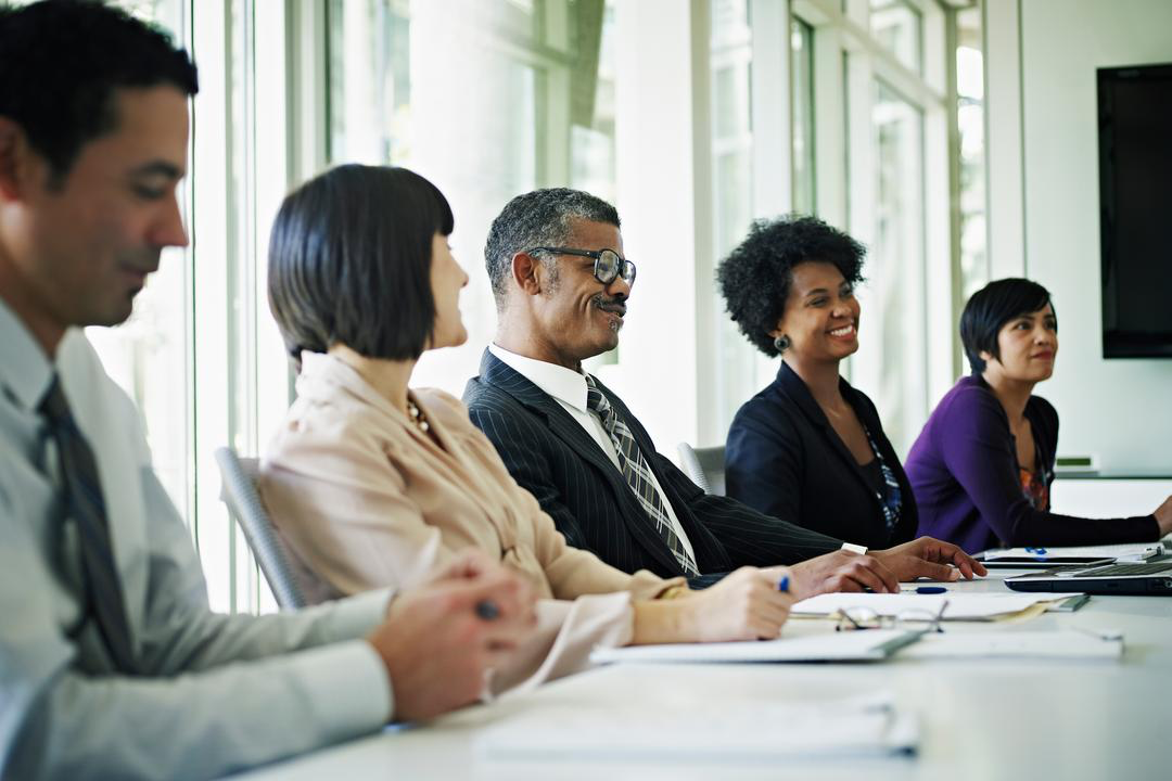 Business team meeting around a conference table
